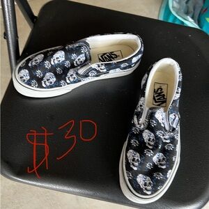 Vans Black and White Skull Print Slip-On Sneakers